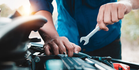 Mechanic open vehicle hood checking up auto mobile, fixing a car at home,Repair and service