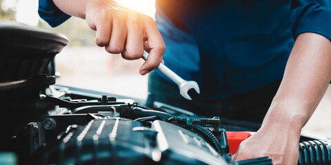 Mechanic open vehicle hood checking up auto mobile, fixing a car at home,Repair and service