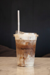 Ice mocha coffee in a glass with cream