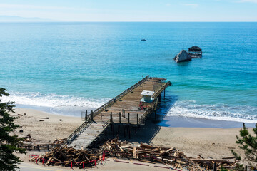 Aerial view of ruined Seacliff Pier and SS Palo Alto cement ship damaged by the winter storm in 2023