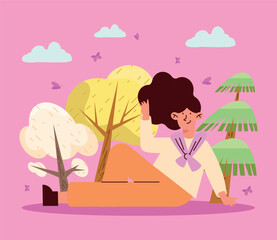 woman seated in spring forest