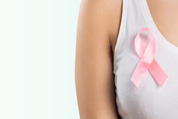Happy woman and pink ribbon,breast cancer concept