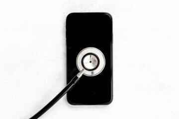 Plakat Electronics repair servise concept - mobile phone with stethoscope
