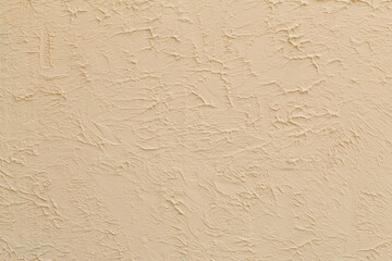 Rough textured wall surface, decorative plaster. Backdrop for design, graphic resource. Texture...