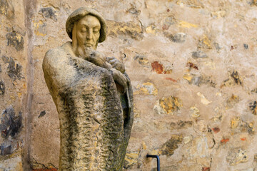 Ancient sculptures in the architecture of the city. Historical and cultural heritage. Background.
