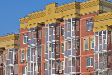 Fragment of the facade of a multi-storey residential building