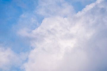 Background of blue sky with white clouds