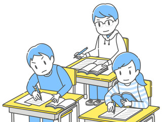 真剣な表情で机に向かって勉強する3人の子供