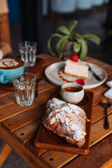 Beautuful Breakfast at the Coffee Shop with Crossant and Cheescake