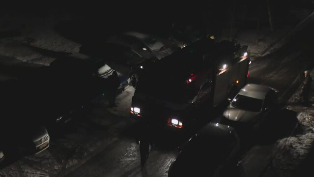Fire engine turned on beautiful side lights leaving the yard