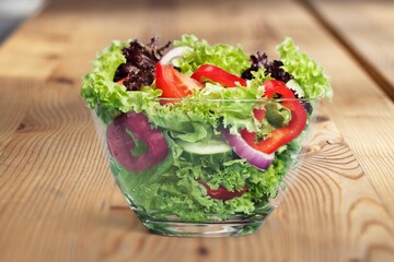 Fresh tasty salad with vegetables in bowl