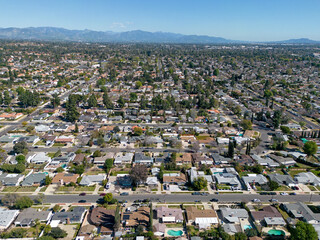 The San Fernando Valley, located in northern section of greater Los Angeles, California is shown from an aerial view during an afternoon day.