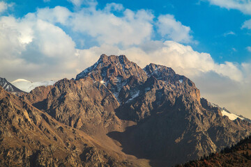 Abai and Chryschaty peak in summer in Almaty Alatau mountains. Tien Shan mountain system in Kazakhstan.