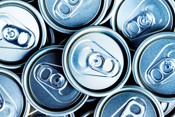 Close up aluminum can lids used for containing beverages