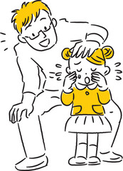 泣いている女の子を慰める若いお父さん