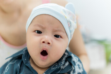 Asia Baby yawning