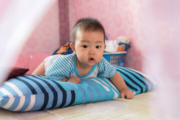 Asia Cute baby playing in bedroom