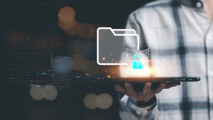 Businessman showing data access protection with key icon, cyber security ,Protecting data from theft ,digital security unlocking or encryption, virus protection and safety alerts ,internet security