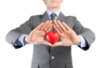 Man holding a red toy heart concept for valentine's day,