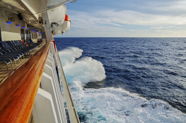 Massive freak wave spray from bow of cruiseship cruise ship liner at sea during Transatlantic Ocean...