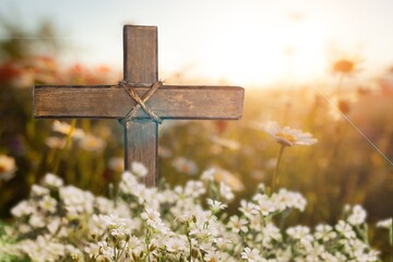 Wooden Cross in fresh spring flowers