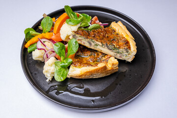 Spinach and mushroom quiche with fresh salad