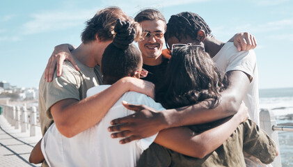 Bonding friends, huddle or diversity by beach in solidarity travel, community support or group social gathering. Smile, happy men or women circle embrace, summer holiday vacation or global trust hug