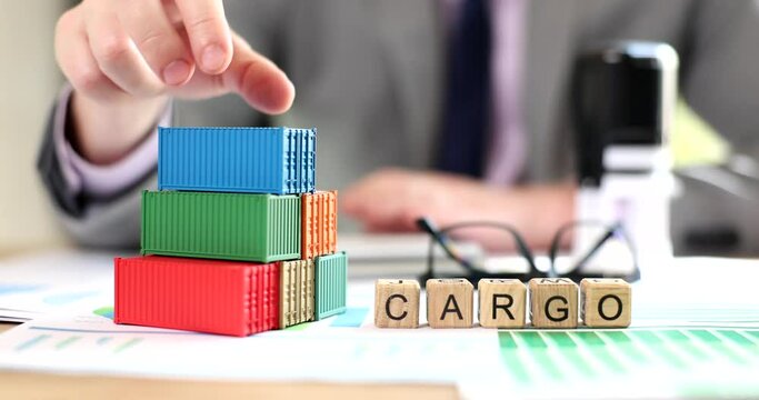 Sales agent considers delivery of cargo in containers