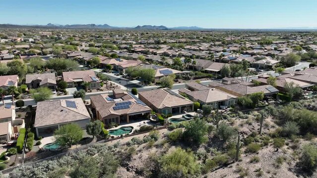 Establishing drone shot of a retirement neighborhood in Peoria, Arizona.