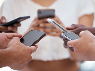 Hands, phone and people networking on social media, mobile app or chatting on mockup screen. Hand of group holding smartphone in circle for online network share, data sync or communication on display