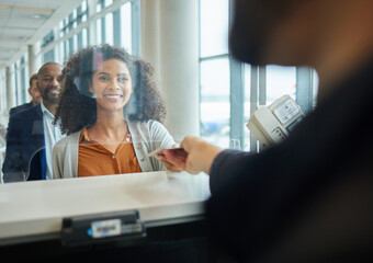 Black woman, ticket check and airport counter with a paper for travel or box office service. Happy...