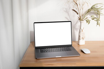 Fototapeta premium Notebook mockup with vase and eucalyptus