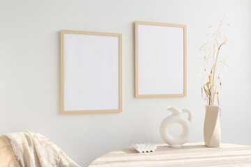 2 wooden frames mockup near wooden table