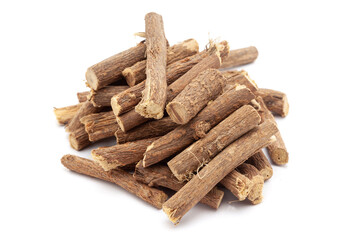 Closeup of Mulethi or Liquorice (Glycyrrhiza glabra) roots, isolated on white background.