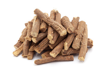 Closeup of Mulethi or Liquorice (Glycyrrhiza glabra) roots, isolated on white background.
