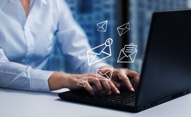  Person receiving and reading e-mail message on computer. Sending e-mails concept.