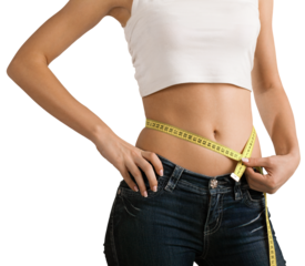 Female fitness model holding a tape measurer around her waist - weightloss concept