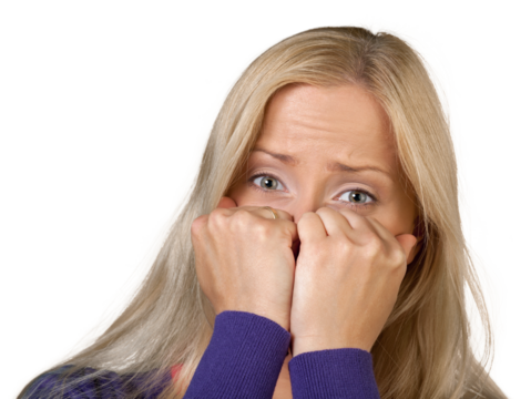 Young scared woman covering face with hands