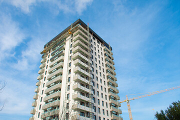 Modern building under construction on a sunny day