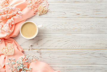 Hello spring concept. Top view photo of cup of cocoa rattan hearts gypsophila flowers and pink plaid on grey wooden desk background with empty space