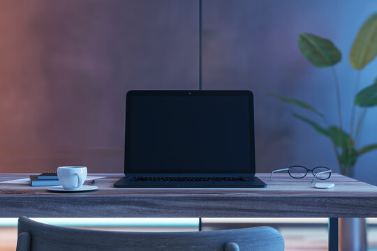 Front view on blank black modern laptop screen with space for web design or web site on wooden work table with coffee mug and eyeglasses on dark wall background. 3D rendering, mock up