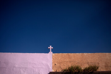 A pink cross decorates a home in Queretaro, Mexico
