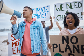 Protest, environment and climate change with man and megaphone on beach for nature, earth day and...