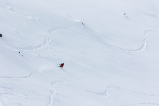 A Teenage Skier Gets To Ski Fresh Tracks After Ski Touring Into The Backcountry Around Cerro Catedral In Argentina