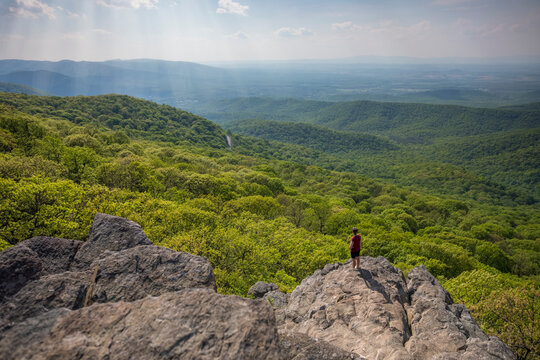 Hiker standing at edge of Humpback Rock, Virginia, USA