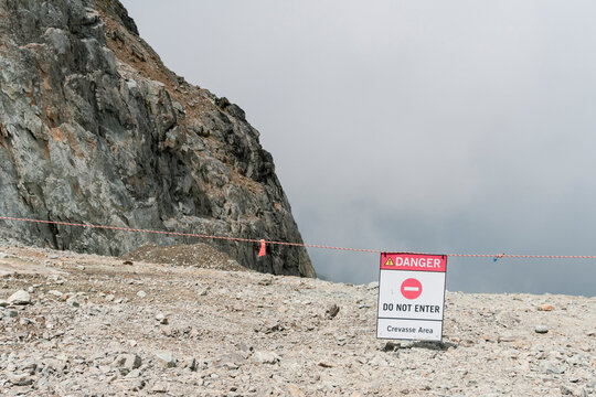 Warning sign near crevasse, WhistlerÂ BlackcombÂ Ski Resort, Whistler, British Columbia, Canada