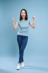 Image of young Asian woman posing on background