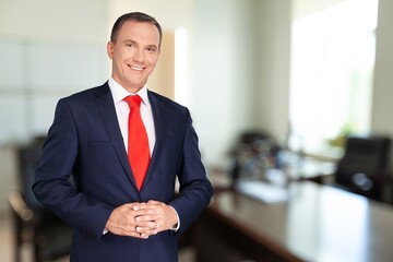 Fototapeta premium Smiling young business man employer in office