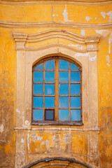 Fototapeta na wymiar Old vintage window in stone wall - medieval style - window to the past