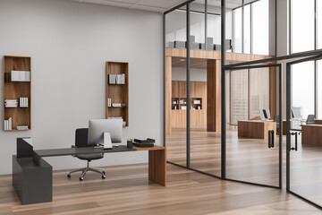 Corner view on bright office room interior with desktop